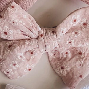 Fabric bow clip with cute floral detailing